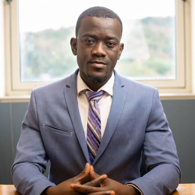 Oumar Soumaharo at a desk